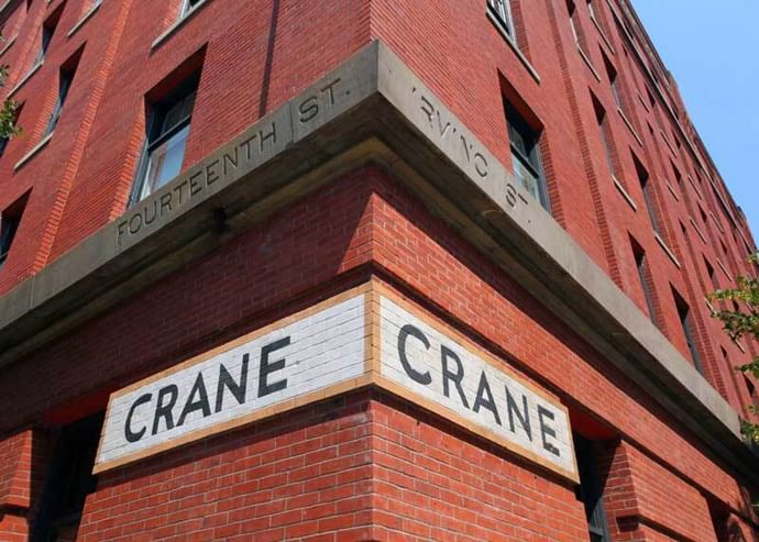 Street view of the corner of the Crane Building in Portland, Oregon.