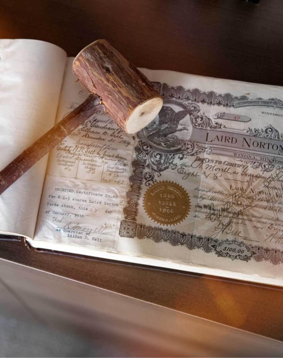 Laird Norton Yards certificate of incorporation and a wooden gavel.